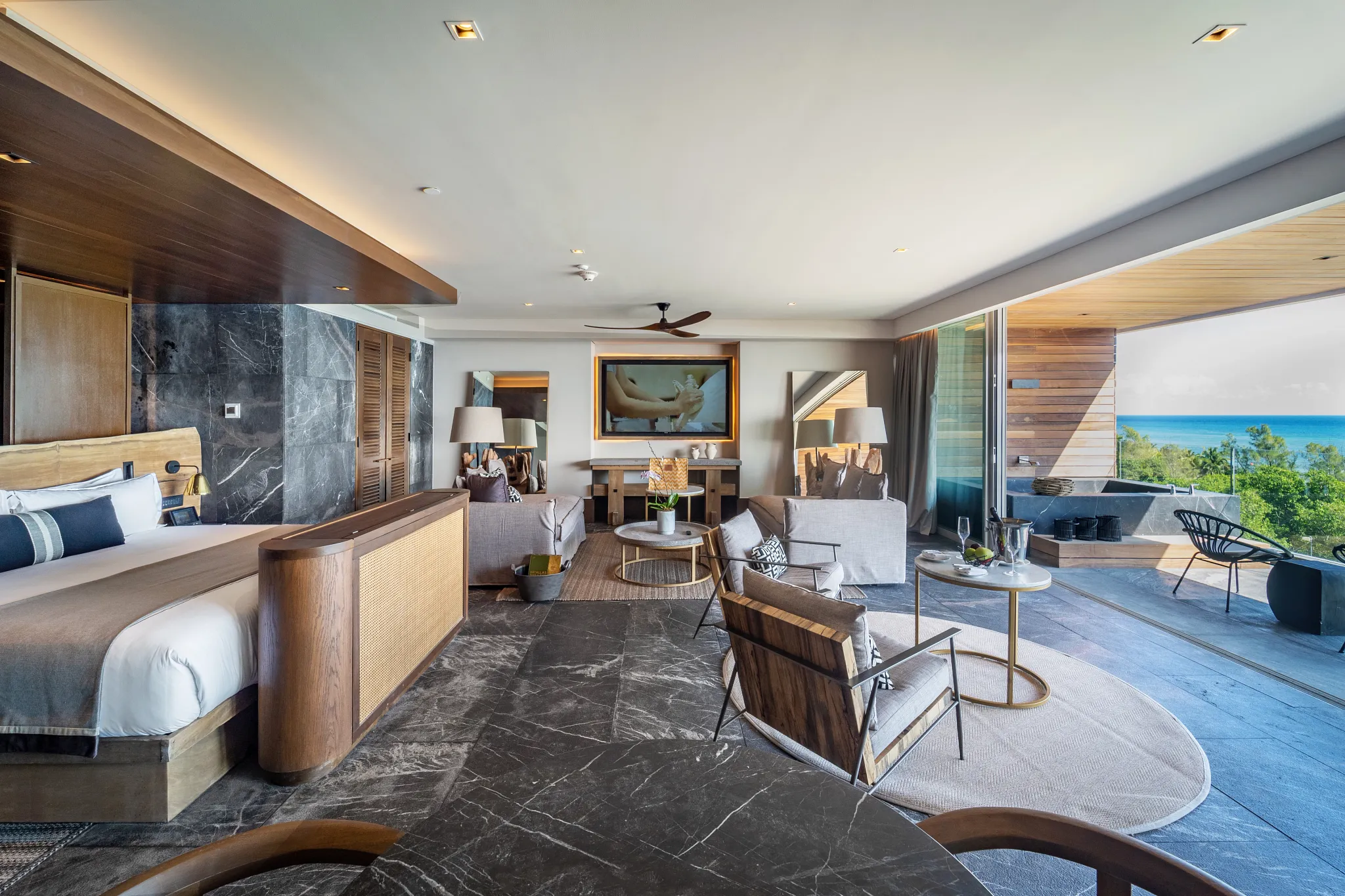 Master Suite Ocean Front living room with kitchenette at Impression Moxché by Secrets.