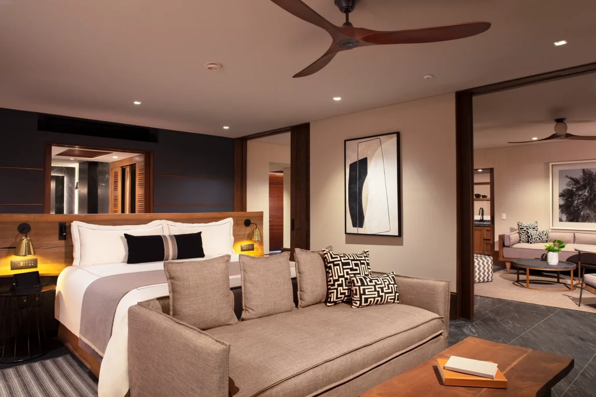 Master Suite Ocean View bedroom with king bed and separate living area at Impression Moxché by Secrets.
