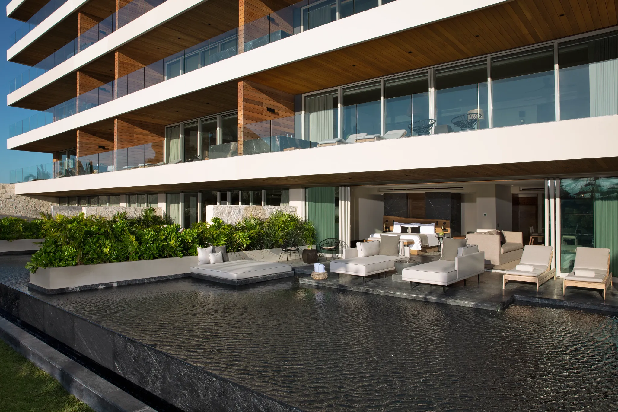 Master Suite Swimout Tropical View outdoor lounge with private pool at Impression Moxché by Secrets.