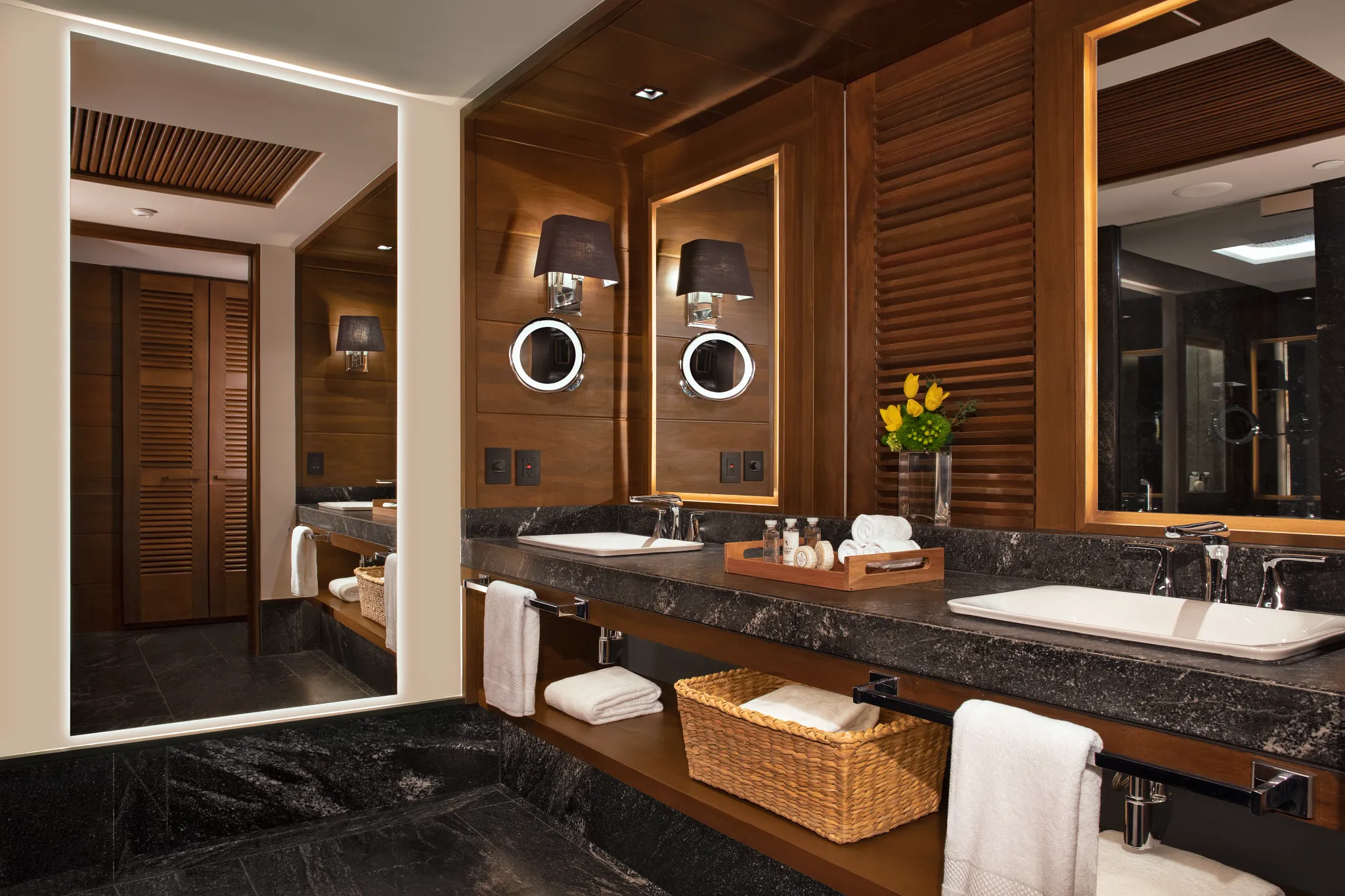 Signature Suite Ocean View bathroom with dual sinks and backlit mirrors at Impression Moxché by Secrets.