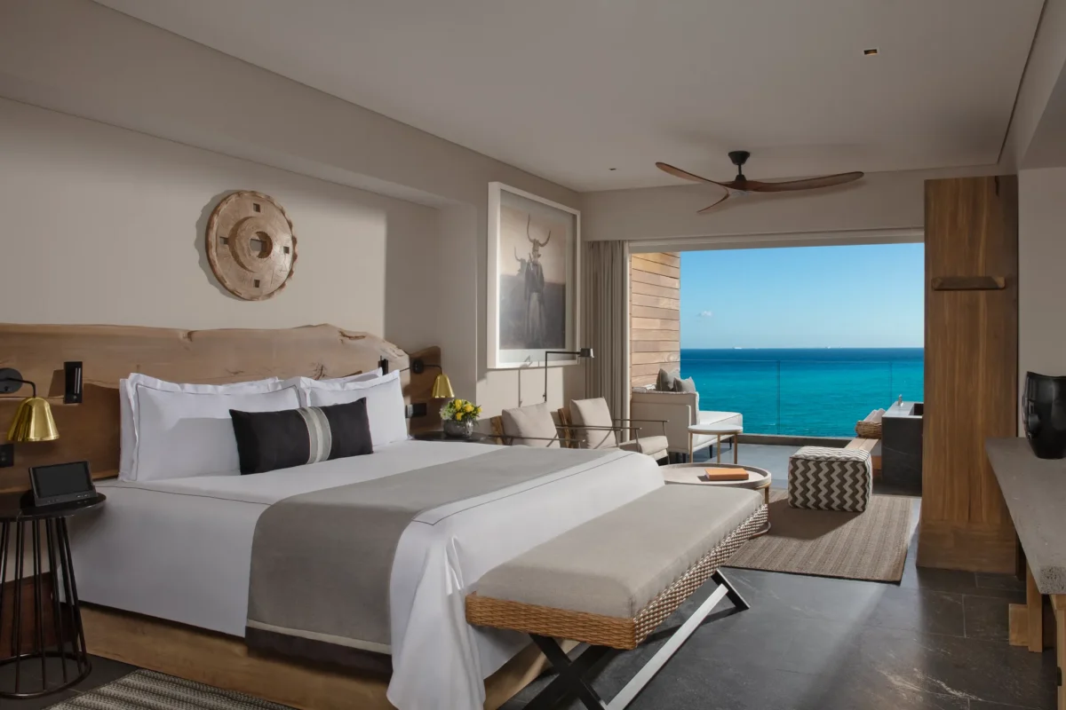 Signature Suite Ocean View with king bed and private terrace soaking tub overlooking the Caribbean at Impression Moxché by Secrets.